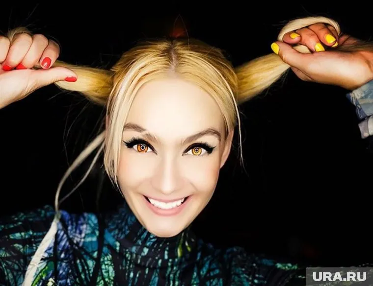 Ольга Городецкая называет себя художником моды и безумным дизайнером одежды