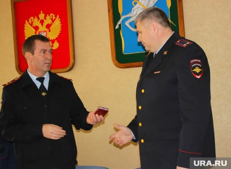 Евгений Оленич (слева) возглавил ОМВД по Сосновкому району