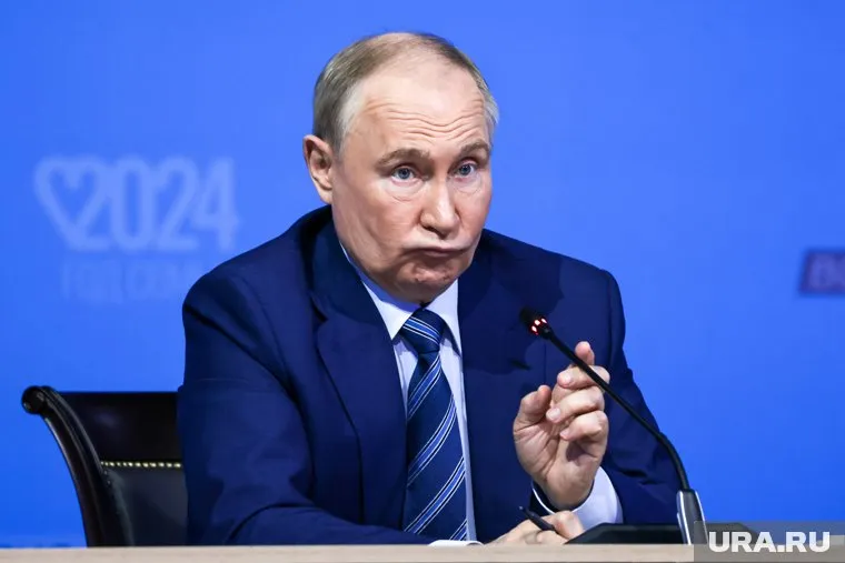 Владимир Путин пошутил, что взял кофе в кредит