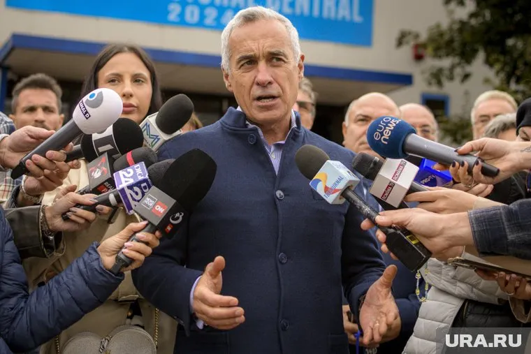 В первом туре победил Георгеску, сообщает FT