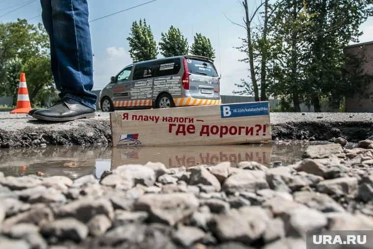 Улица Химмашевская превратилась в сплошные ямы
