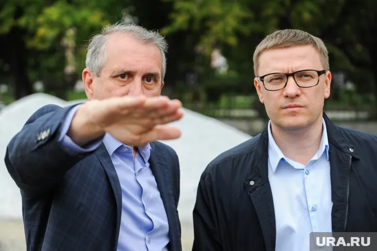 Алексей Текслер (справа) решил сменить министра спорта Леонида Одера (слева)