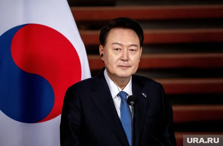 Юн (на фото) может уйти с поста президента Южной Кореи, заявил Хан Дон Хун