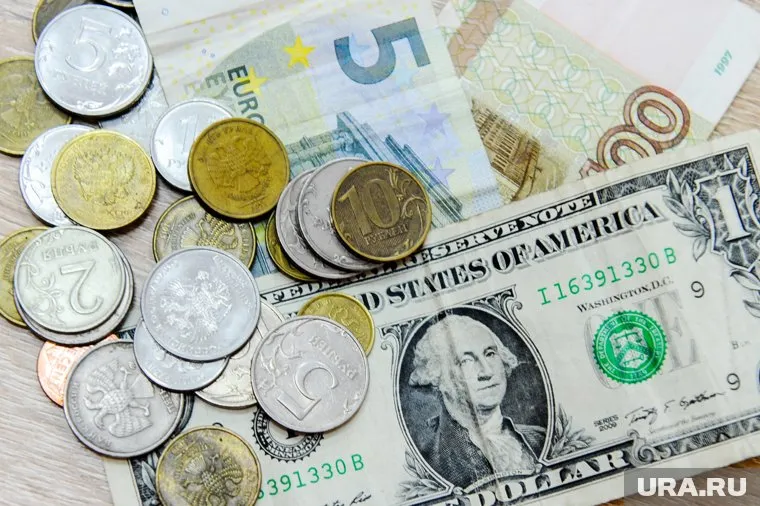 Курс доллара вырастет до 105 рублей