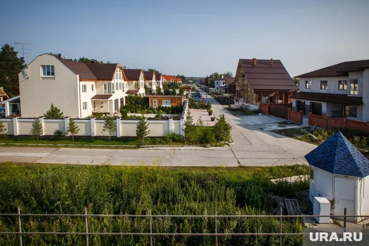 В каждом таунхаусе будет по десять квартир, столько же будет мест для парковки