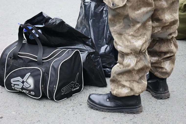 Отправка мобилизованных от кинотеатра "Спутник". Курган