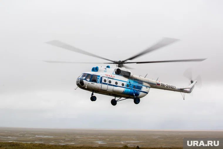 Вертолеты через переправу летают с раннего утра до вечера 