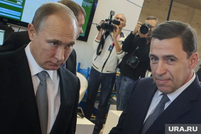 Евгений Куйвашев (на фото справа) пробыл в президиуме Госсовета больше года