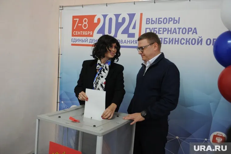 Алексей и Ирина Текслеры прибыли на избирательный участок утром 7 сентября