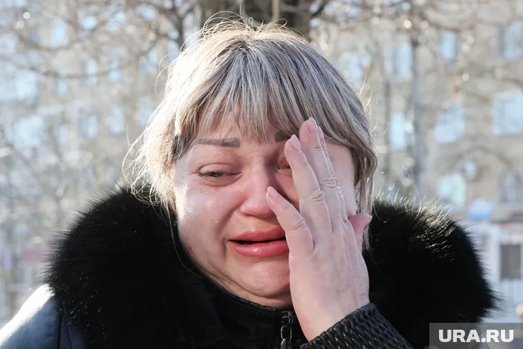 Жители Донецка скорбят по погибшим при обстреле рынка