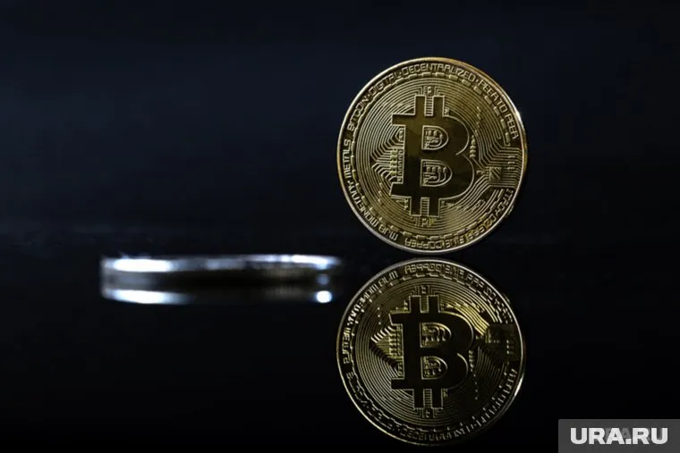 Цена биткоина впервые превысила отметку 52 тысячи долларов