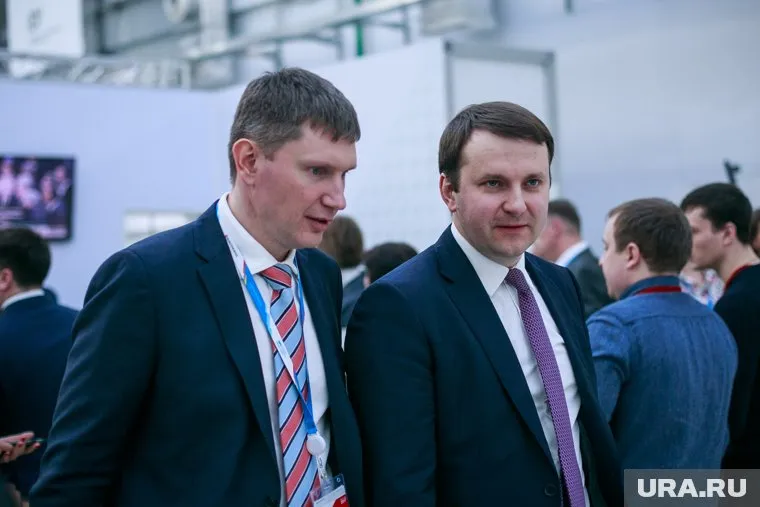 Между помощником президента РФ Максимом Орешкиным (справа) и главой Минэкономразвития РФ Максимом Решетниковым (слева) возник аппаратный конфликт