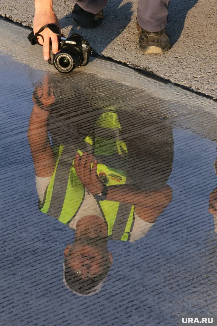 Владельцы машин и члены избиркомов гадают, кому понадобились фото с парковки