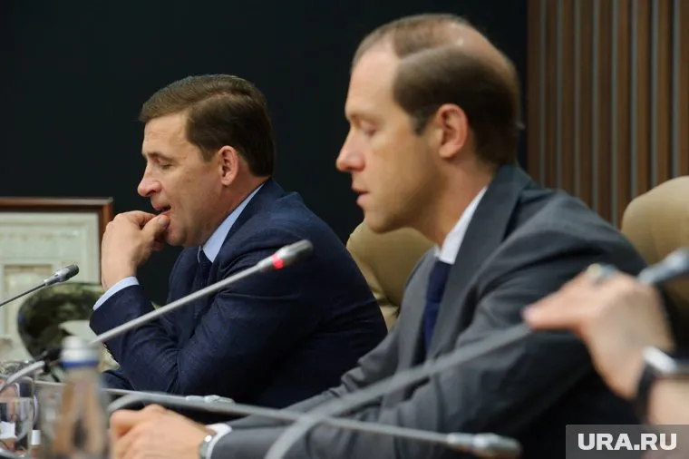 Евгений Куйвашев (слева) и Денис Мантуров (справа) встретились в Москве